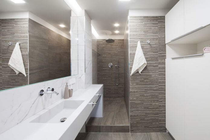 tiling the walls in the bathroom