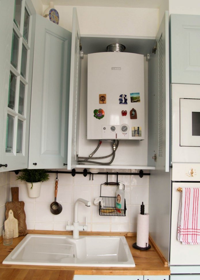 hide pipes in a kitchen cabinet
