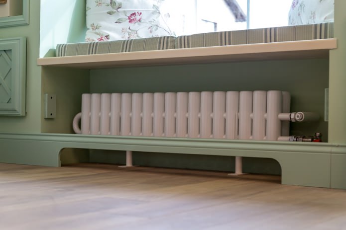 hide a radiator in a room in the Provence style