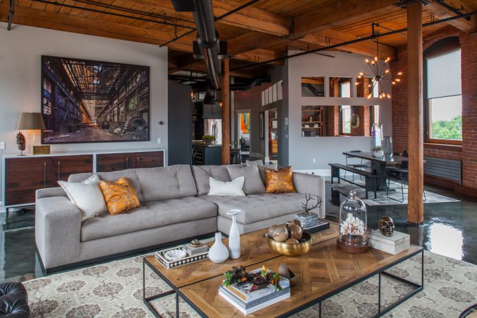 the ceilings are decorated with wooden beams and original pipe structures