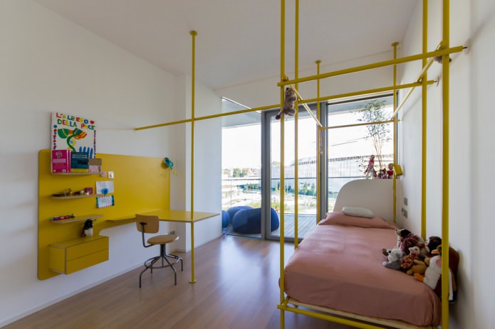 yellow pipes in the design of the child's room