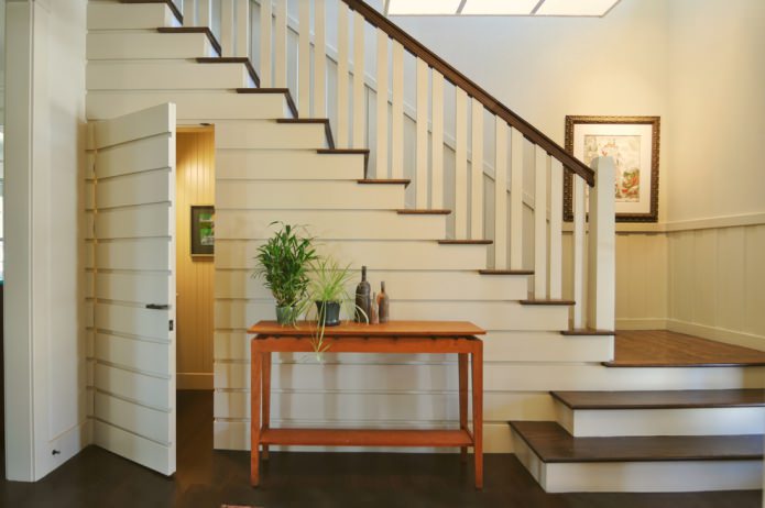 pantry doors merge with the staircase trim