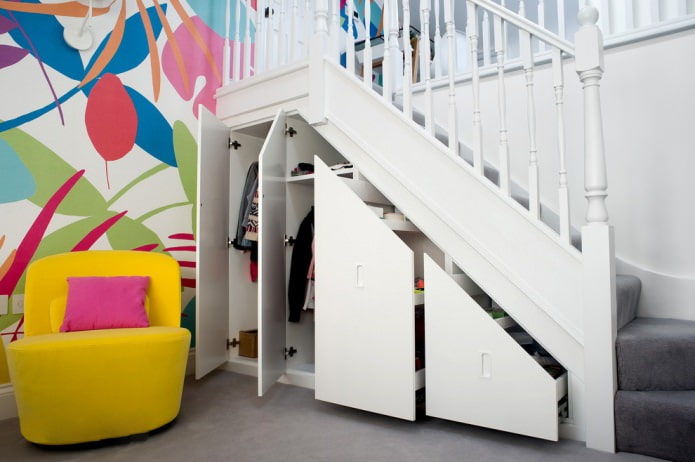 cabinet built under the flight of stairs