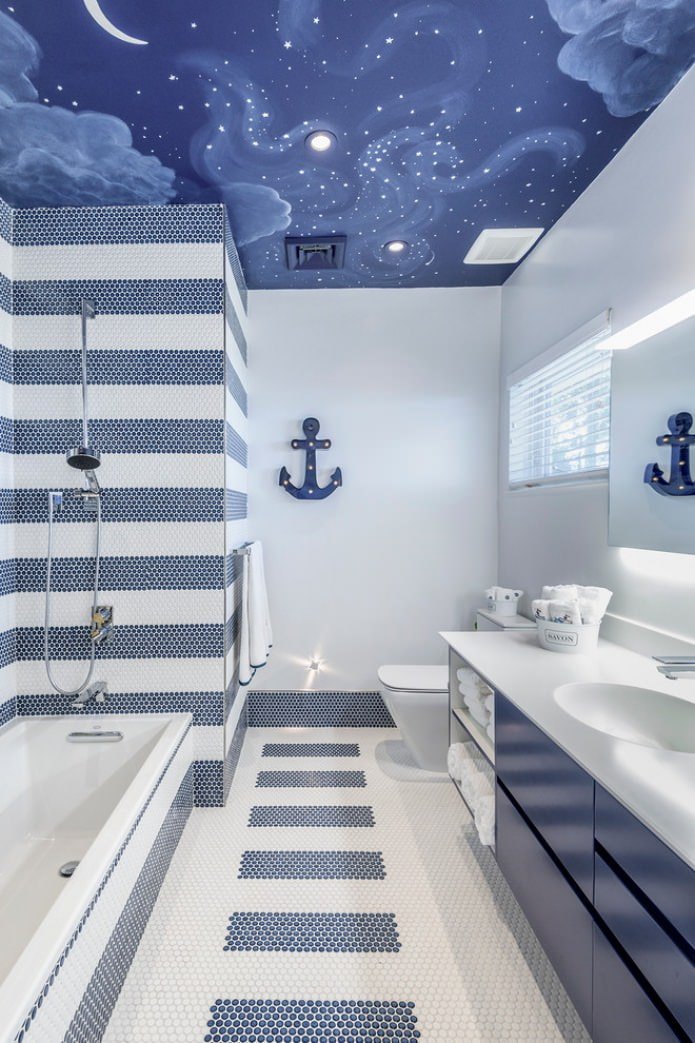 white and blue bathroom with a stretch ceiling