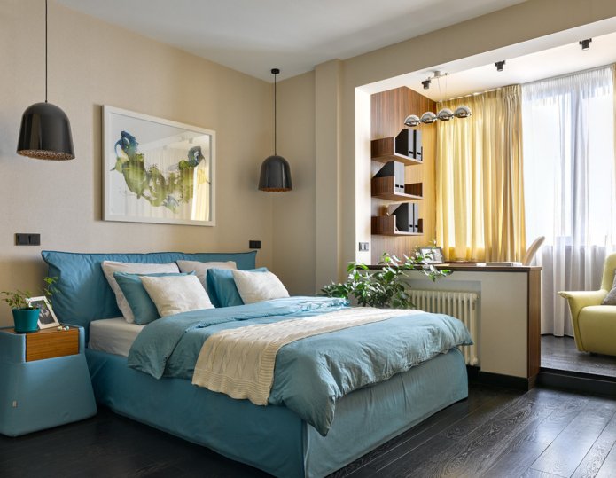 bedroom with a work area on the balcony