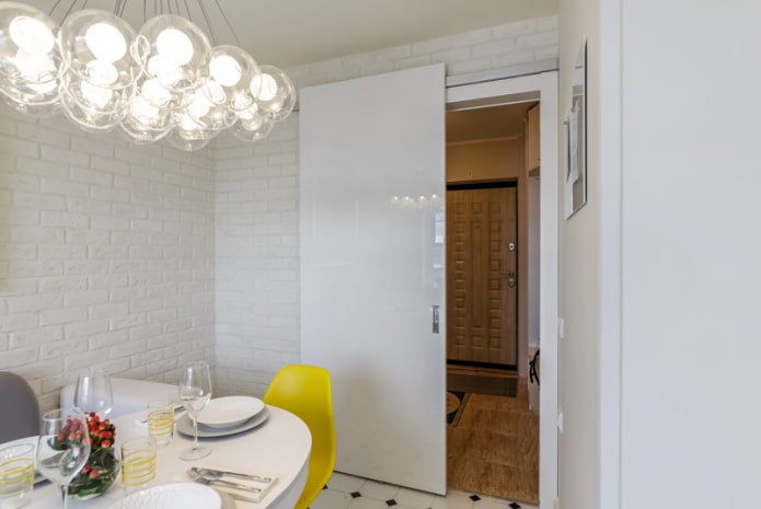 Sliding interior door along the wall