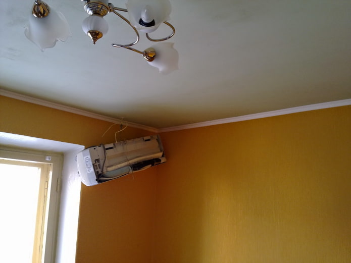 gluing wallpaper under an air conditioner