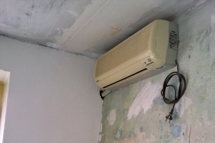 gluing wallpaper under an air conditioner
