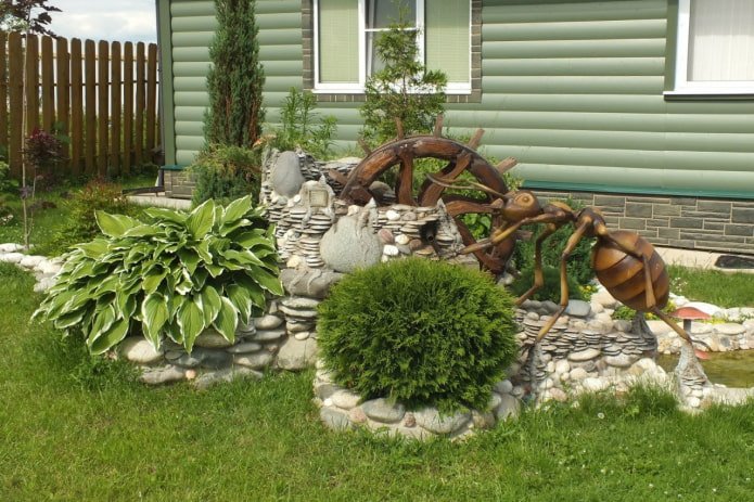 wooden figurines in the garden