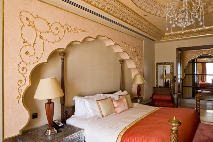 unusual arched structure above the headboard