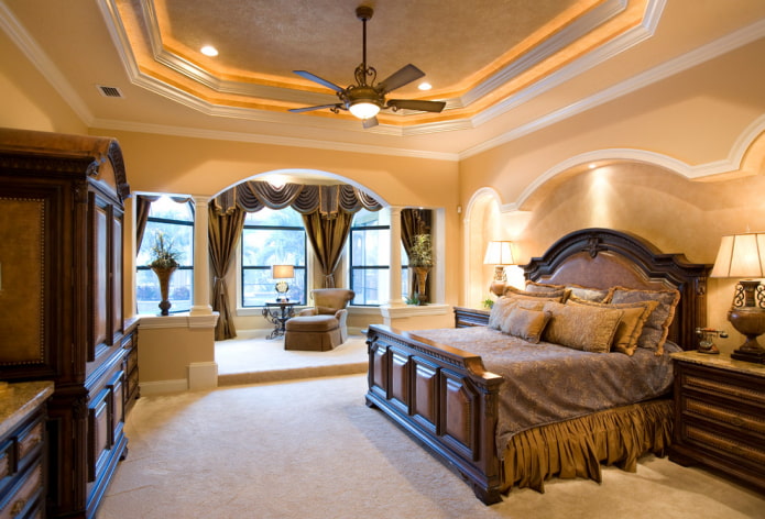 classic bedroom with an arch