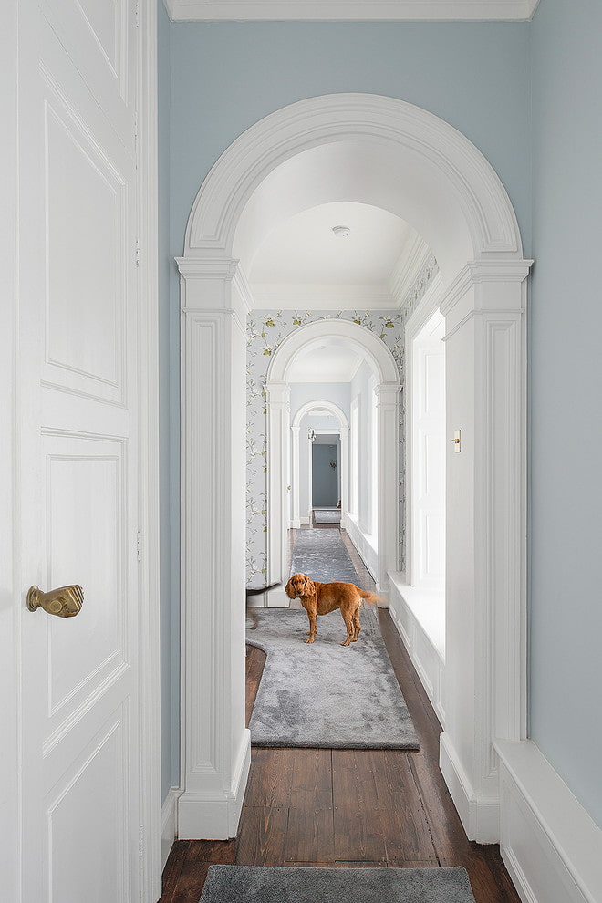 arches in the interior of a long corridor