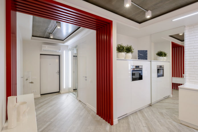 arch between the kitchen and the hallway 