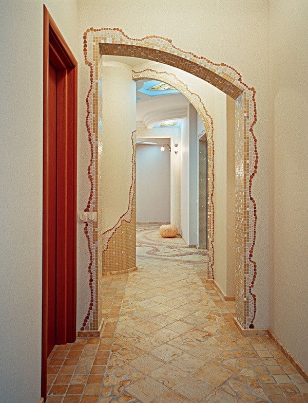 arch with mosaic in the interior of the hallway