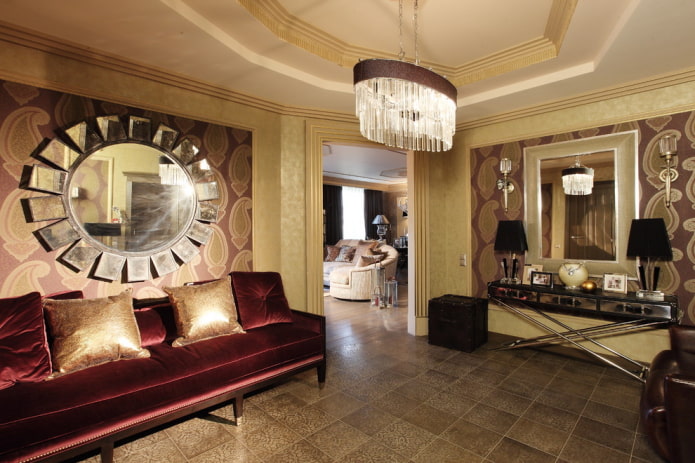 Velvet sofa, sun-shaped mirror