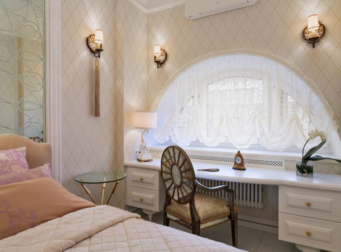arched window decorated with Austrian curtains