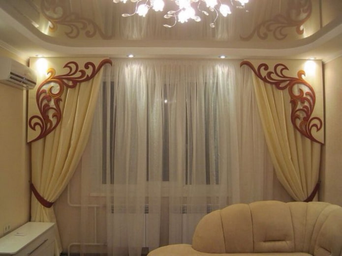 figured lambrequin in combination with curtains