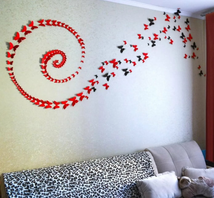 a spiral of butterflies on the wall