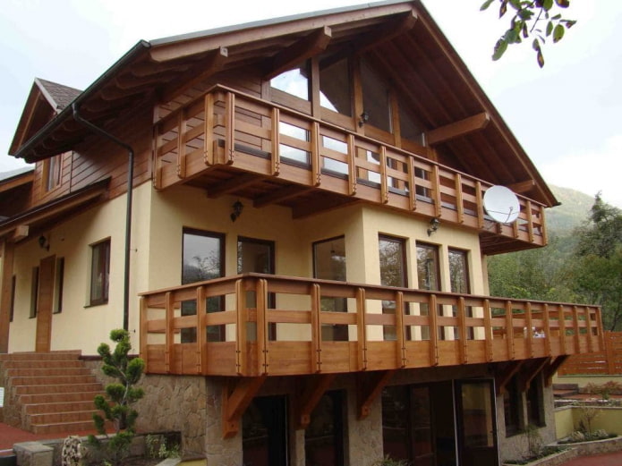 house project with a wooden balcony