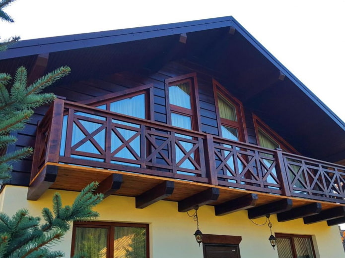 house project with a wooden balcony