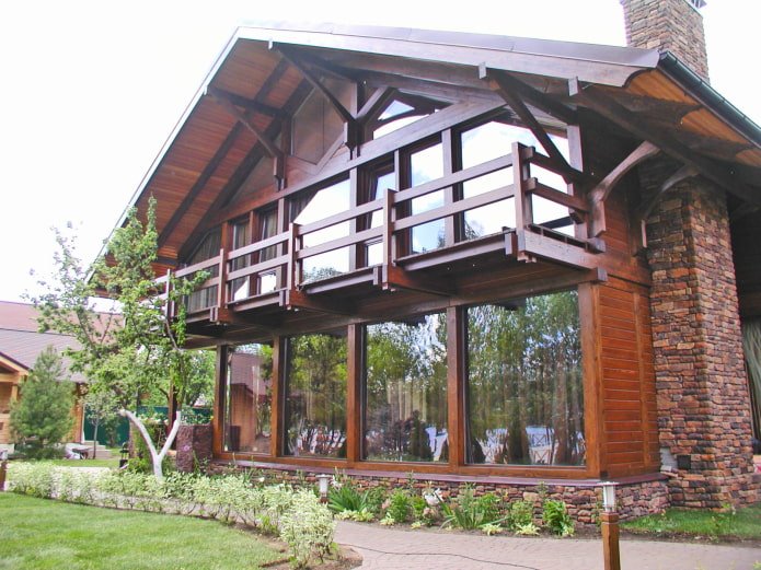 house project with a wooden balcony