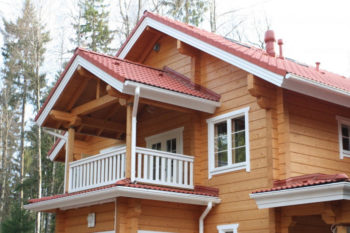project of a wooden house with a balcony