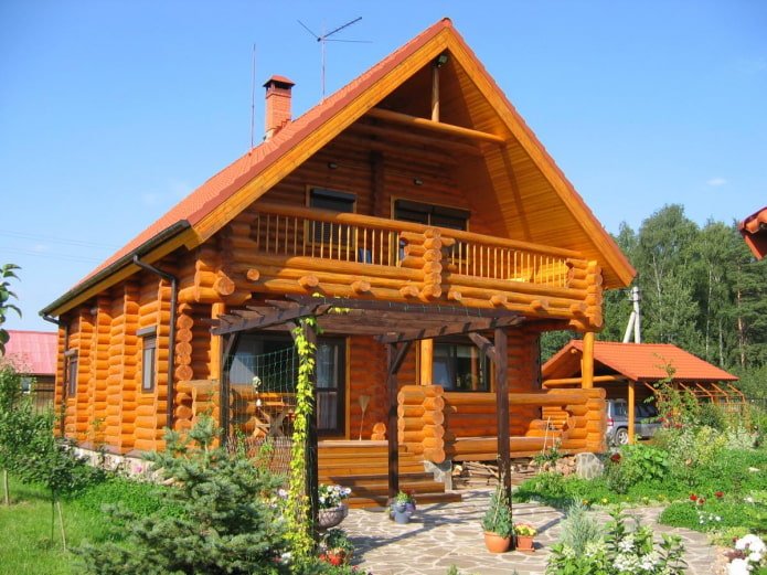 project of a wooden house with a balcony