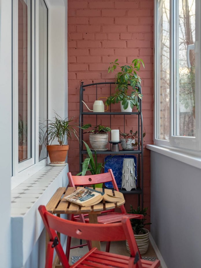 Shelving and seating area on a loft-style balcony
