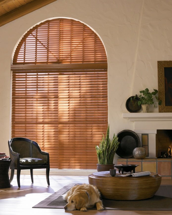 bamboo blinds on an arched window