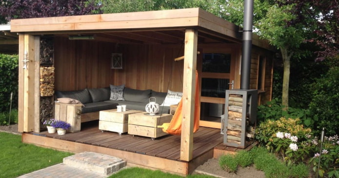 Bathhouse with a terrace and a stove