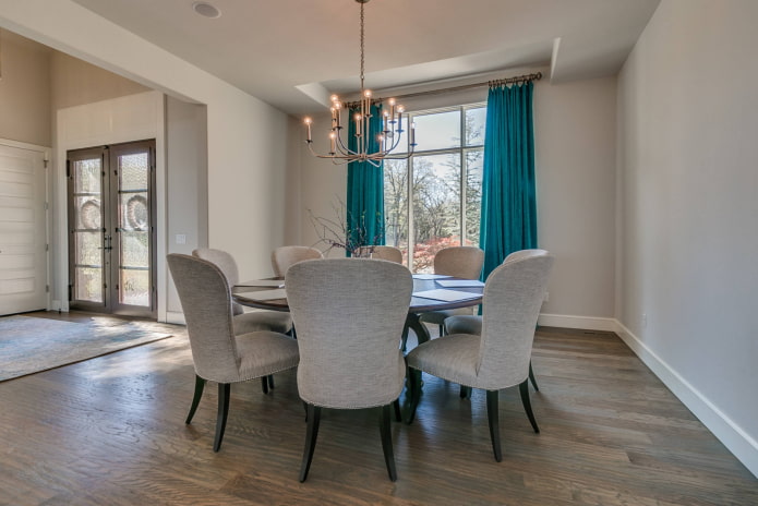turquoise velvet curtains in the dining room