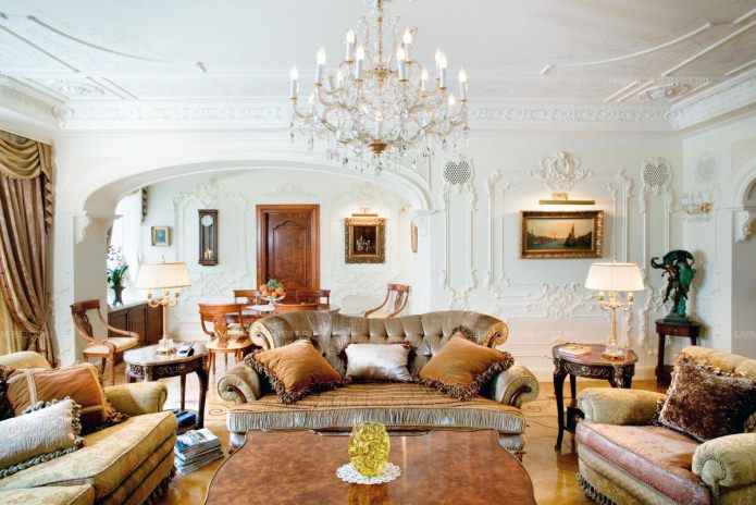 sofa and two armchairs in a baroque style room