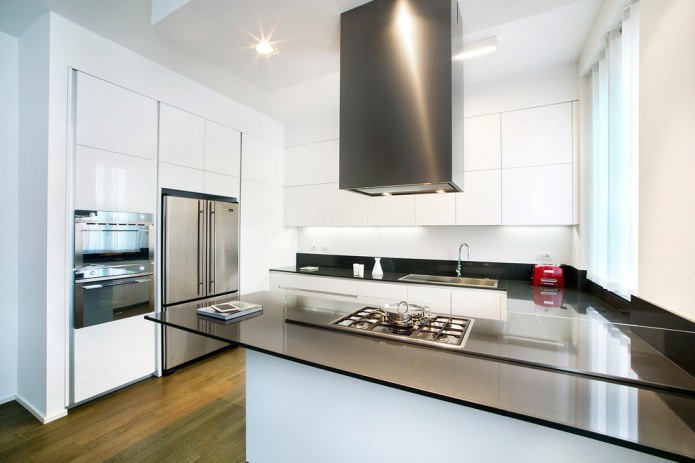 black glass countertop in the kitchen interior