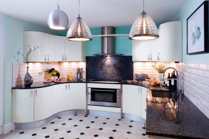 black countertop made of artificial stone in the kitchen interior