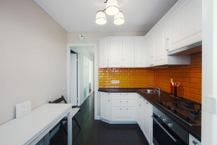 laminated black countertop in the kitchen interior