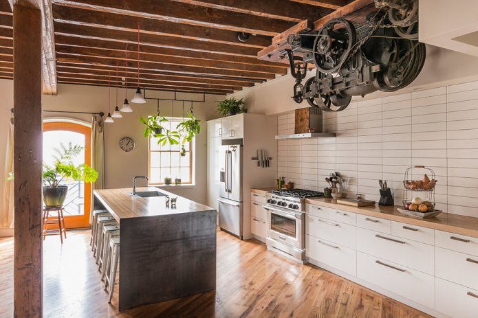white loft-style kitchen with practical brick-like tiles