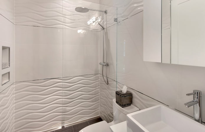 white relief tiles in the bathroom interior
