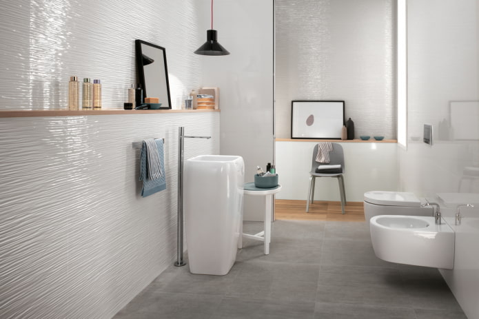 white relief tiles in the bathroom interior