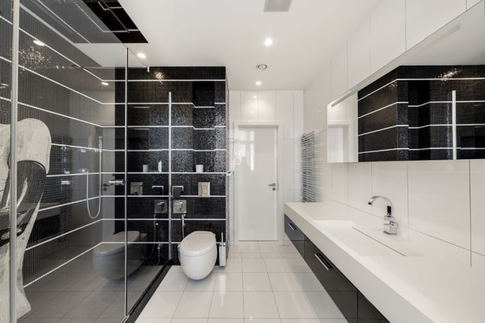 white tiles on the floor in the bathroom