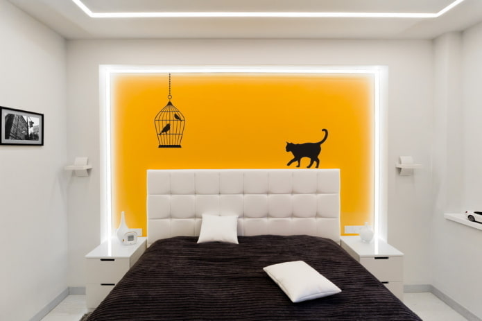 white bedroom with bright accents