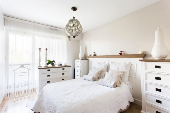 furniture in the bedroom interior in white tones