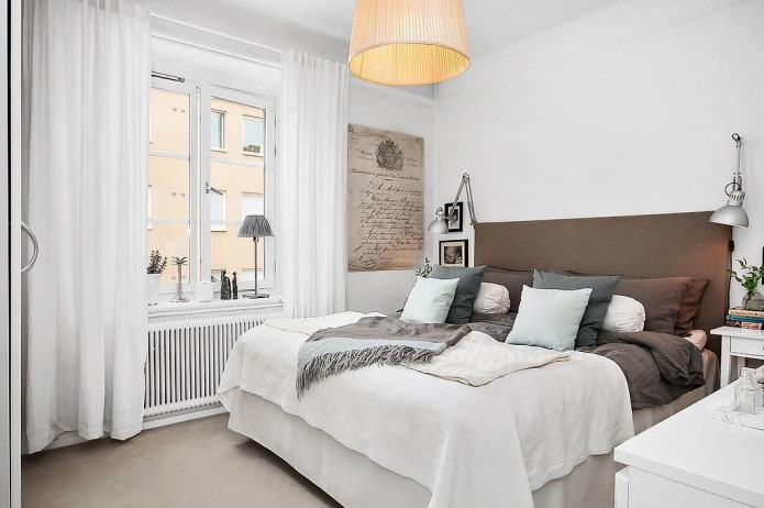 bedroom interior in white and brown tones