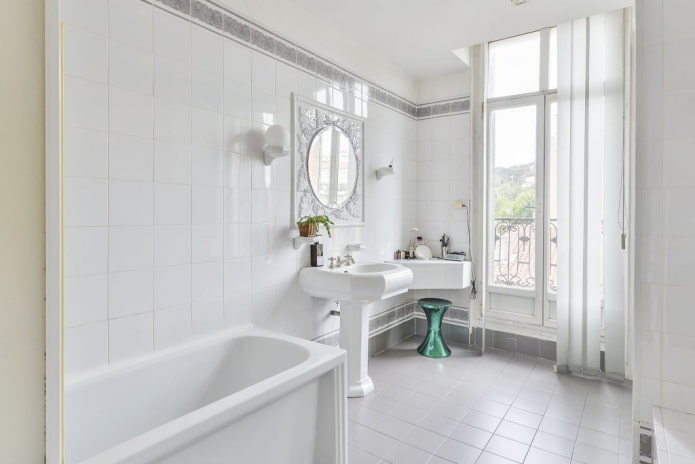 finishing in the interior of the bathroom in white tones