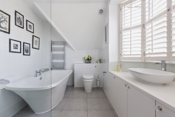 finishing in the interior of the bathroom in white tones