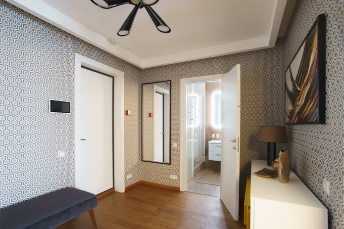 white doors with a brown floor in the interior