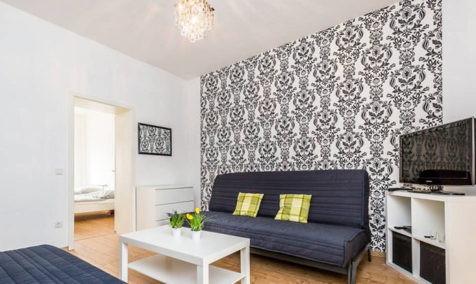 Black floral pattern on white wallpaper