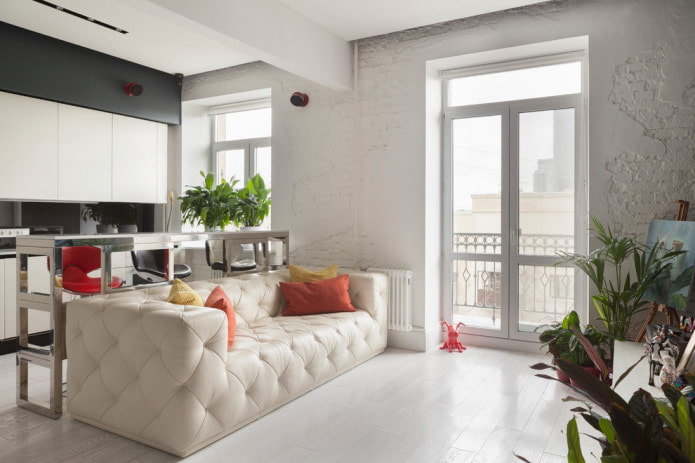 white leather sofa with carriage coupler
