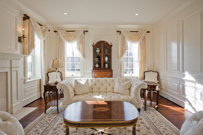 beige curtains and a white sofa