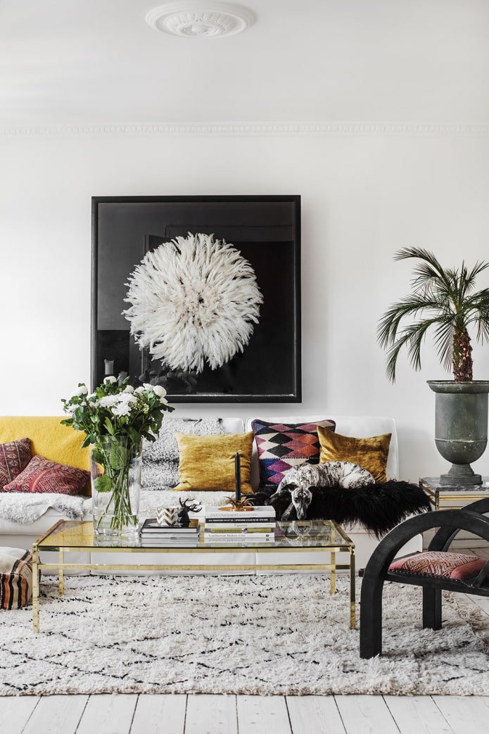 prints in a white living room