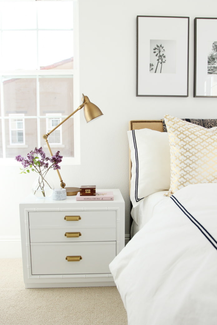 gold accents in a white bedroom